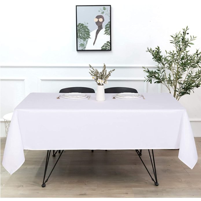 White rectangular tablecloth on a dining table
